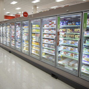 A large display freezer in a store filled with food.