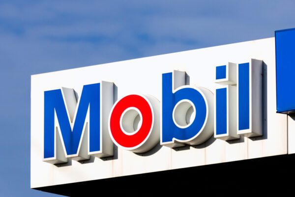 A sign for the mobil gas station.