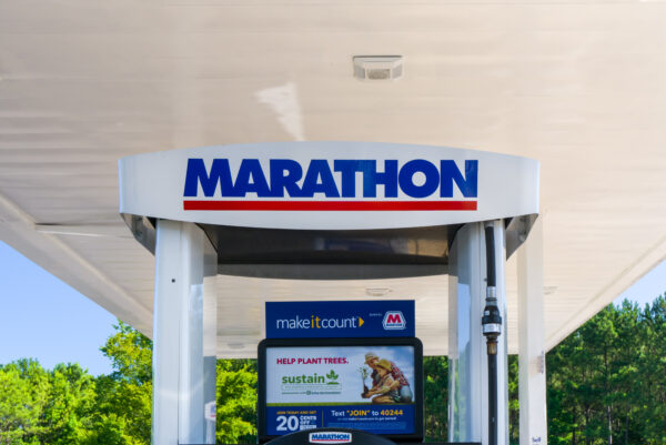 A gas station with a sign that says " marathon ".