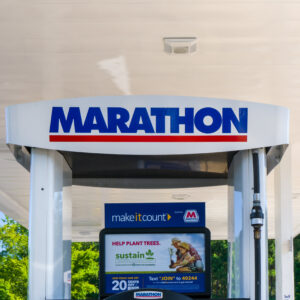 A gas station with a sign that says " marathon ".